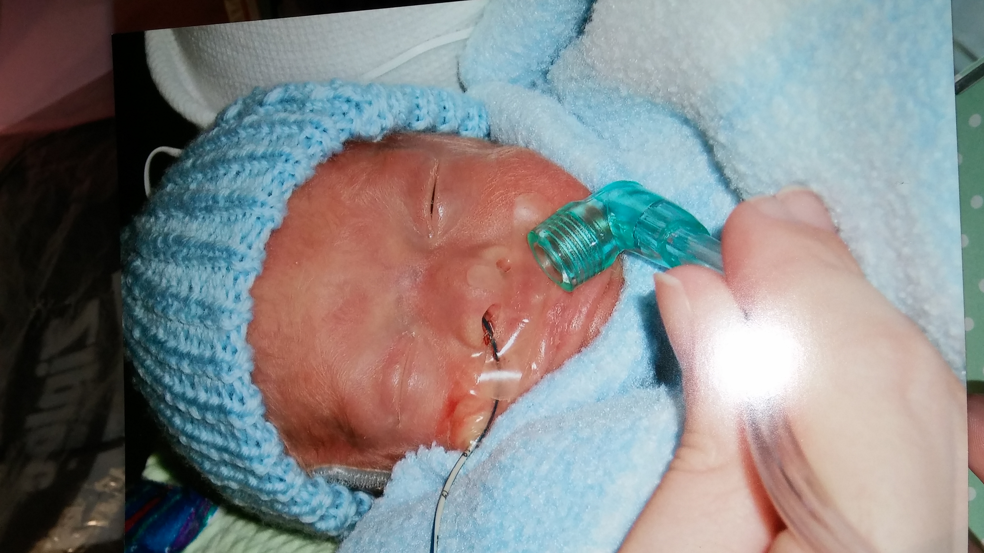 my first time holding Ay. he was 20days old.