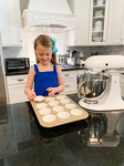 STEP 1 : Grab your trusty sidekick, (bonus points if they're a cute 5 year old with a huge sweet tooth), and have them line two muffin tins with cupcake liners. We're going to make 24 cupcakes total.
