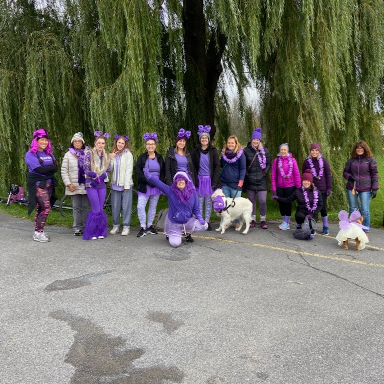 #IDressPurpleBecause