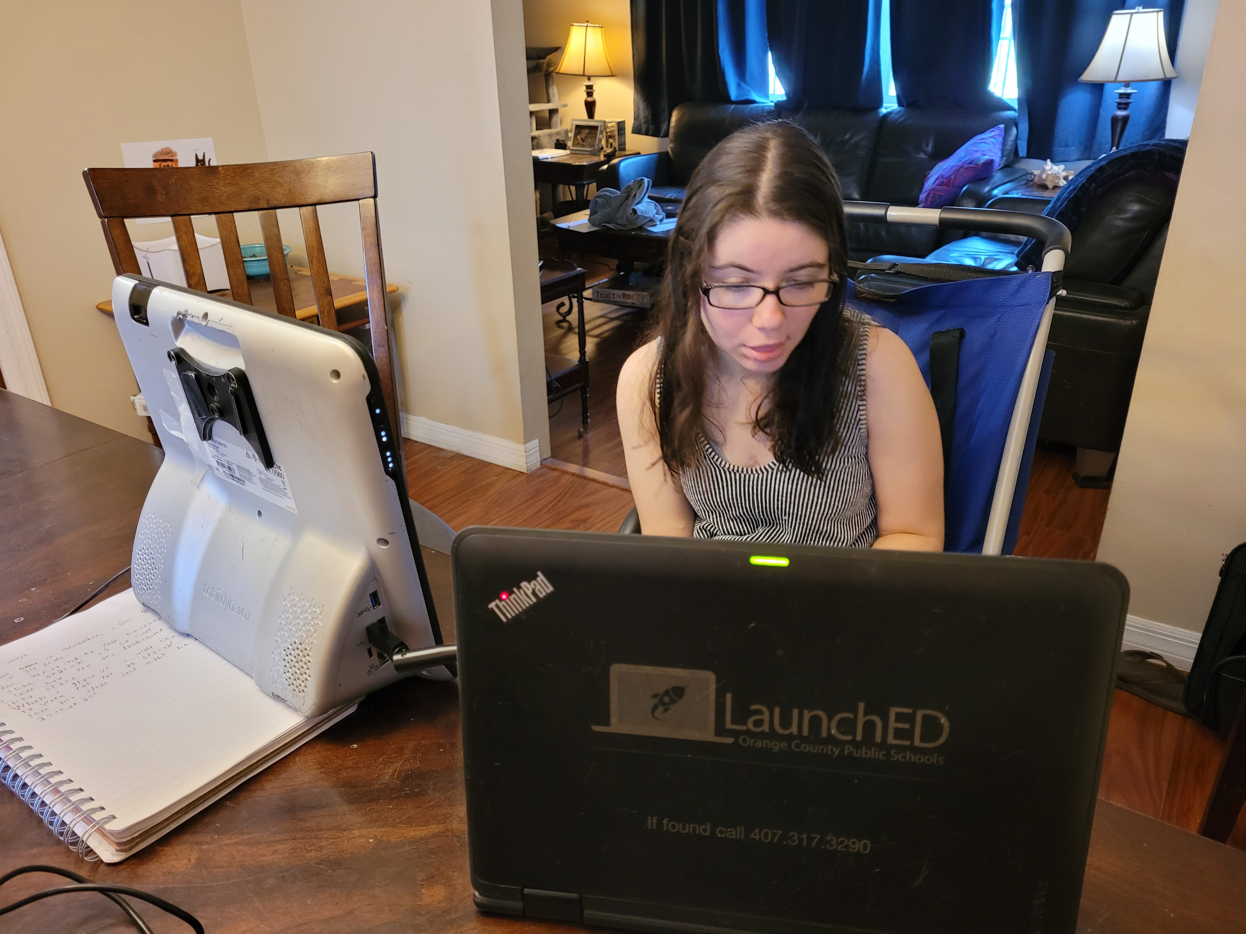 Using her Eye Gaze computer during online speech therapy