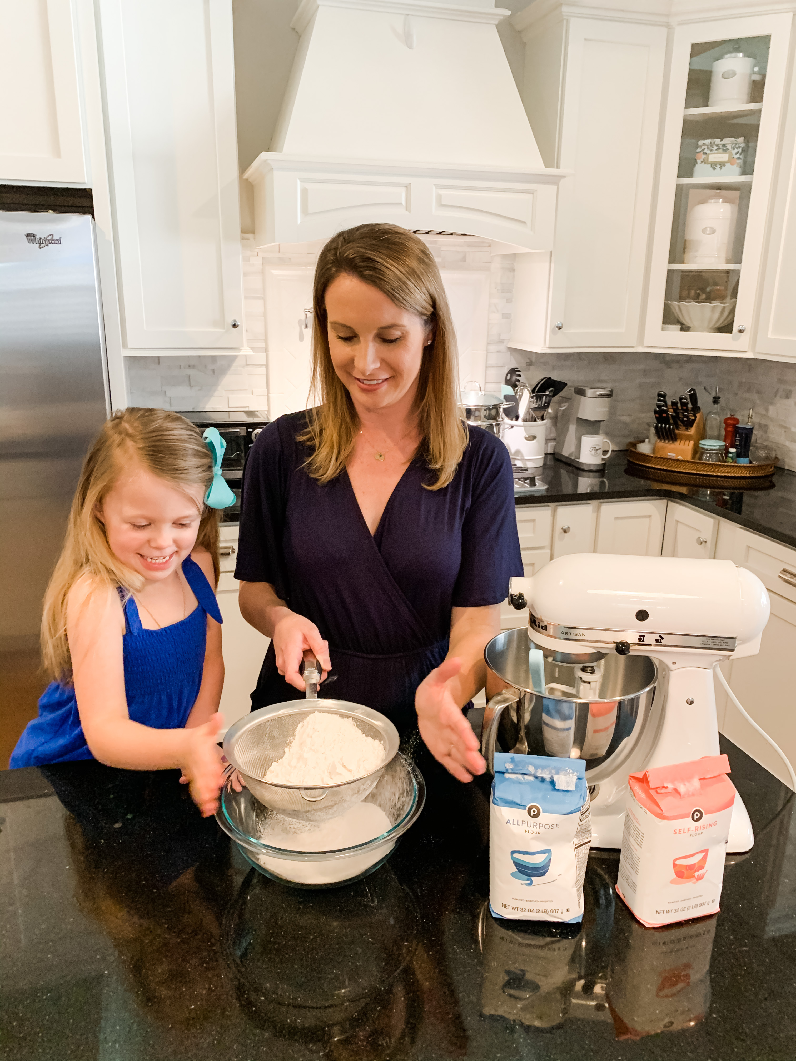 STEP 2 : Sift your flour together into a mixing bowl and set aside. Fun fact, sifting the flour together breaks up any lumps in the mixture and makes for a smoother cupcake.