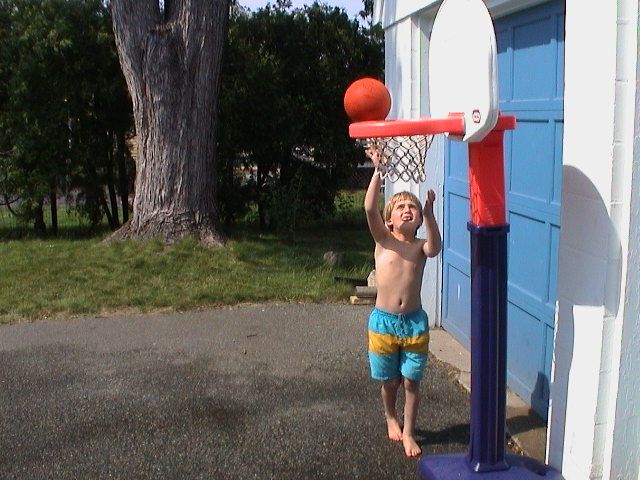 my younger days playing with a children's  basketball hoop