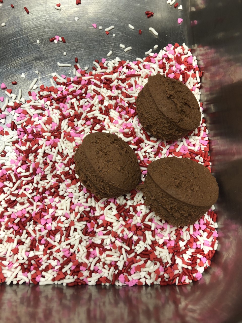 Cookie dough rolled in sprinkles