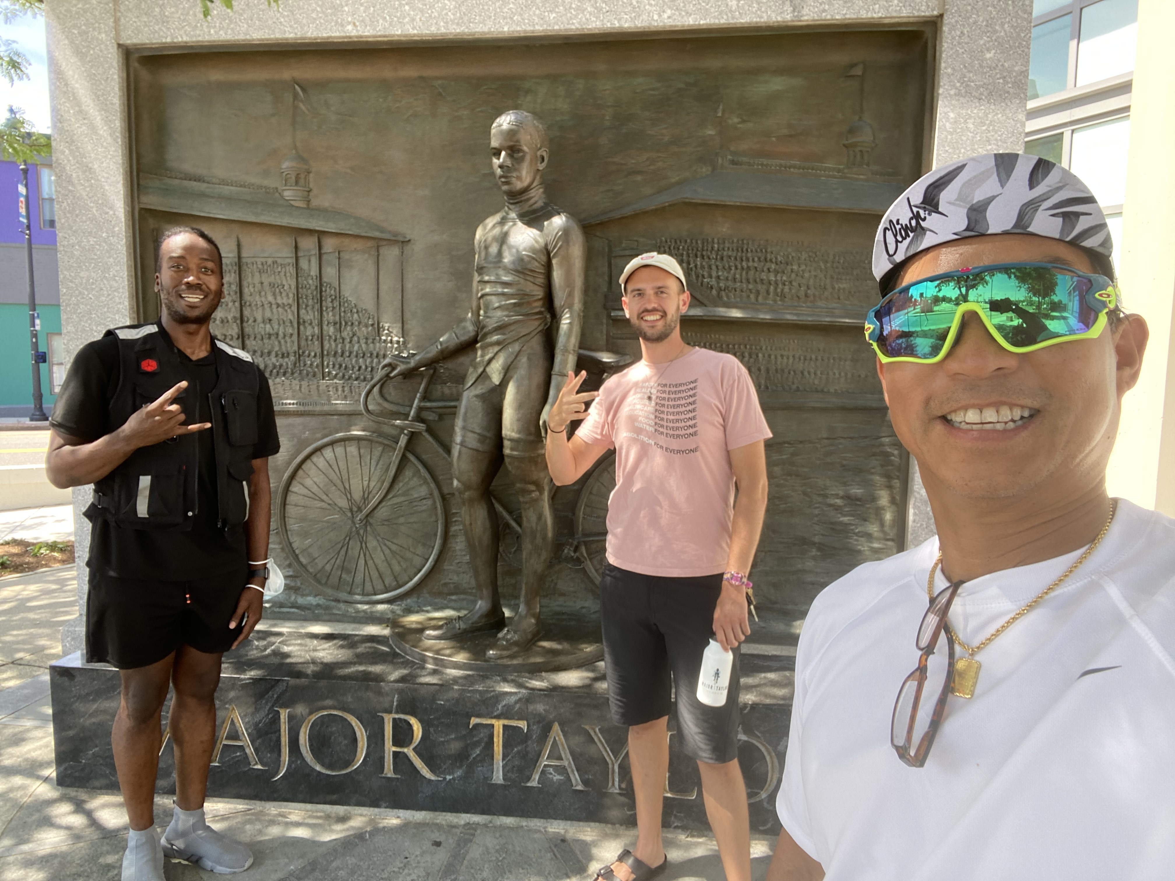 Brothers Karim, Elijah, and Peter celebrating the OG brother: Major Taylor