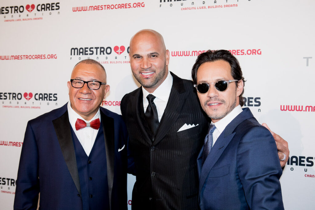 Co-Founder Henry Cardenas, Honoree Albert Pujols, and Co-Founder Marc Anthony