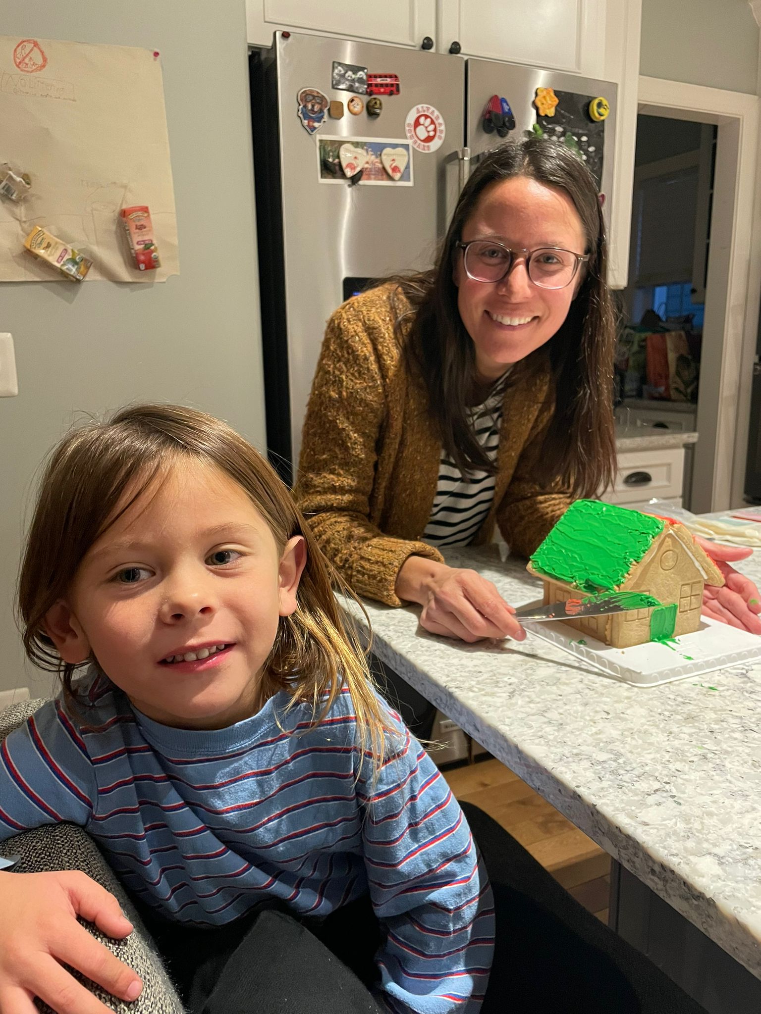 Wy and Mom icing the roof