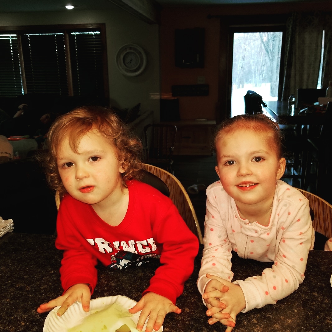 Playing with her brother