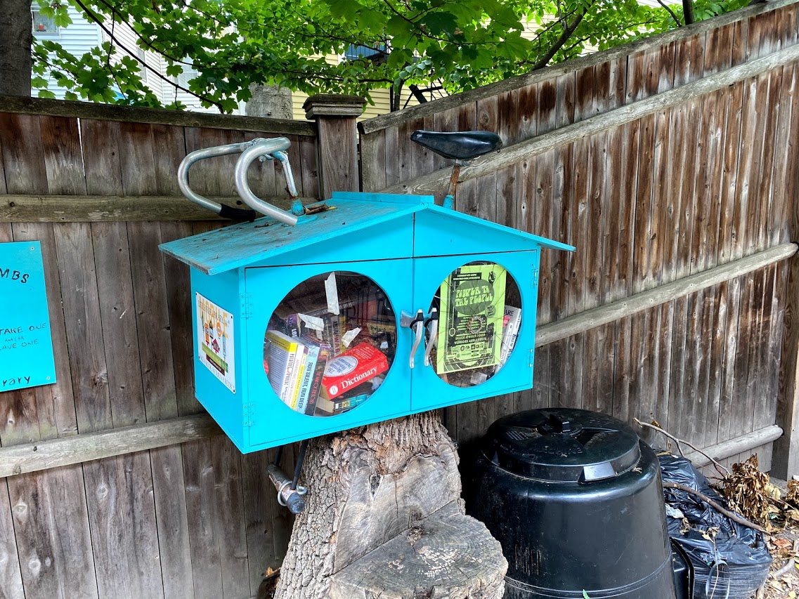 Love this bike-themed library outside the Bikes not Bombs Hub/Shop