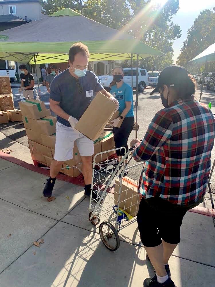 Thys volunteering at the Mobile Food Pantry