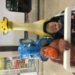 Max driving the animals around at the mall