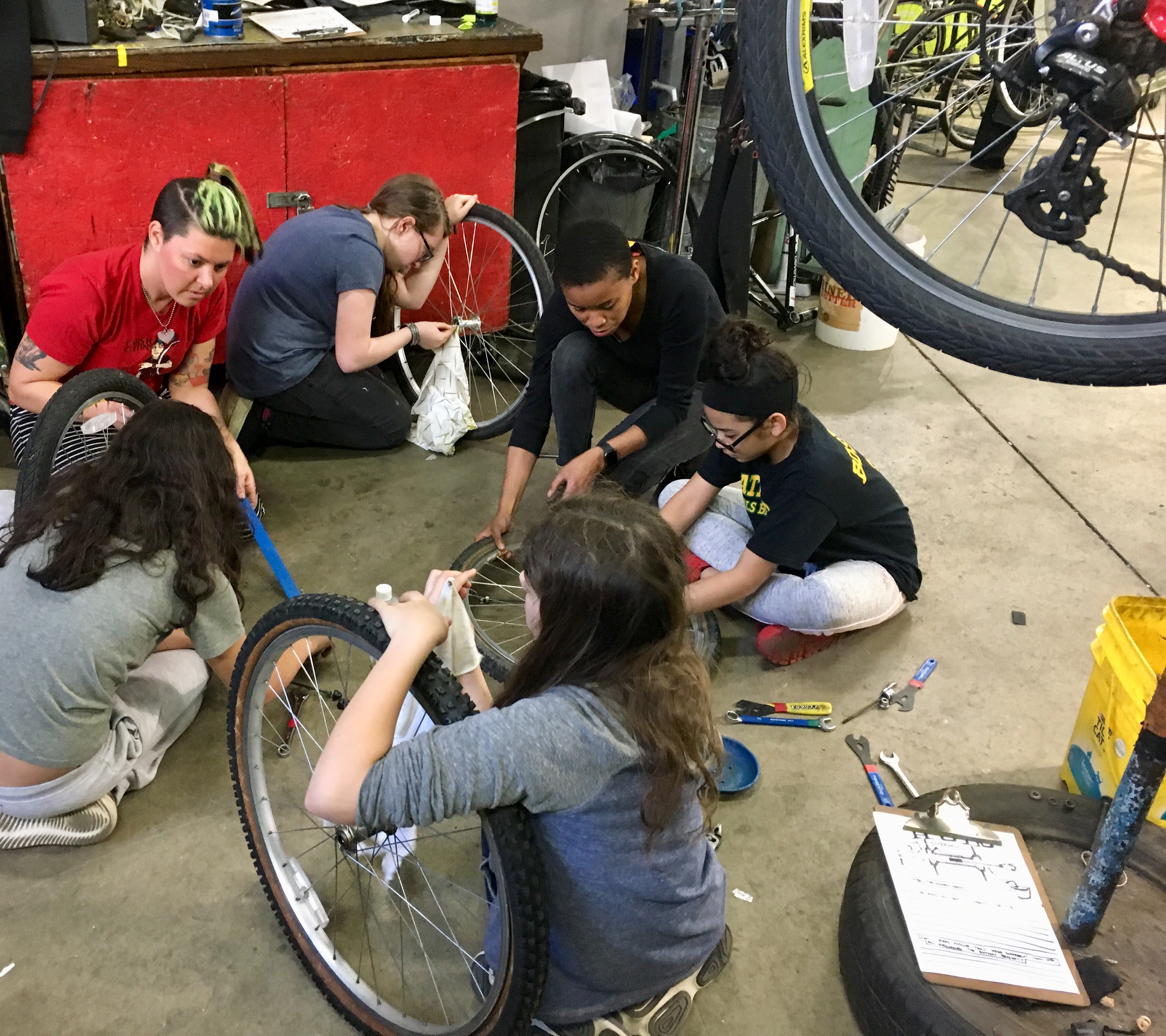 Maddy taking Girls In Action class at Bikes Not Bombs, May 2019