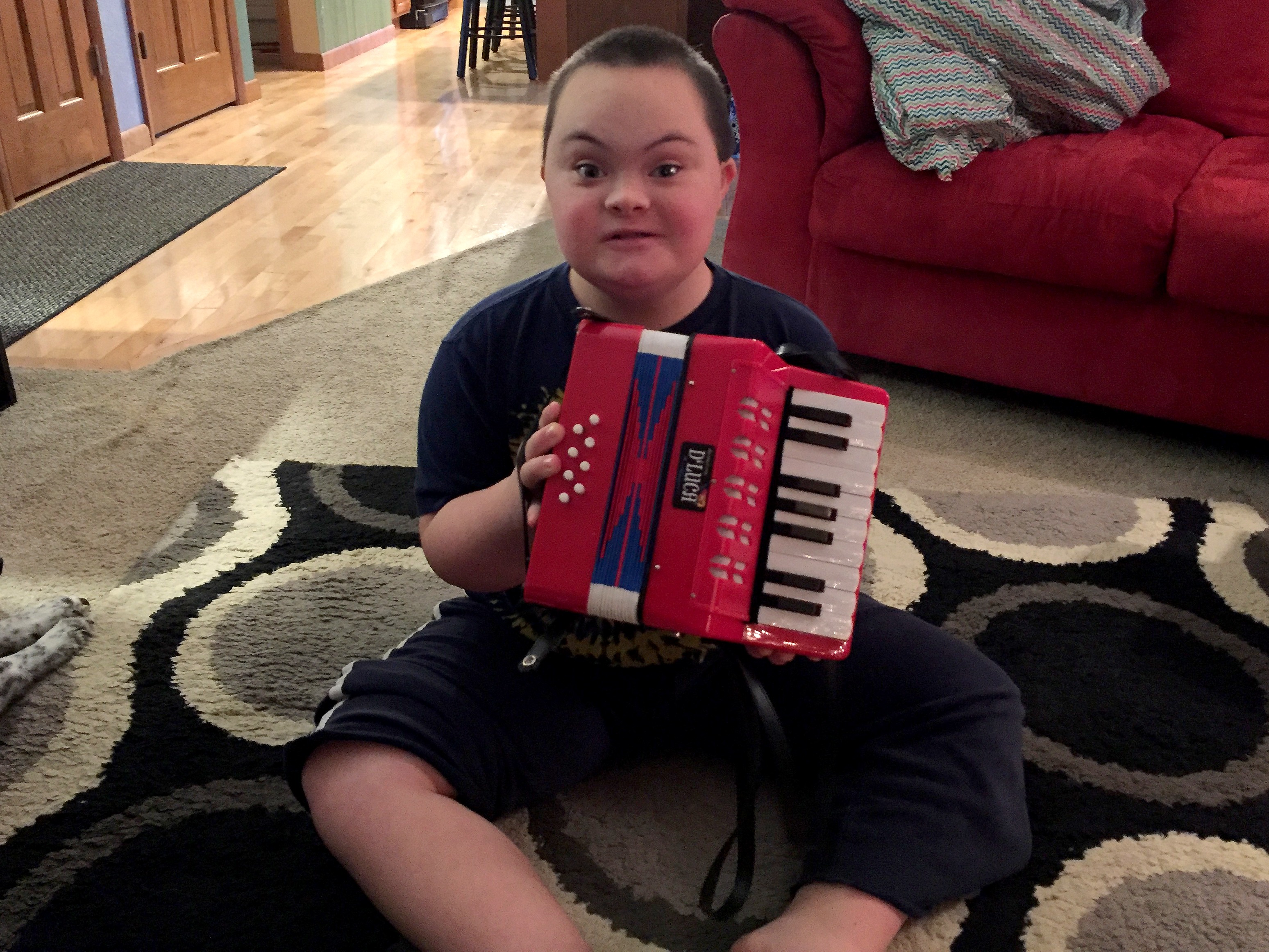 2015 Christmas morning, Quin gets his accordion from Santa