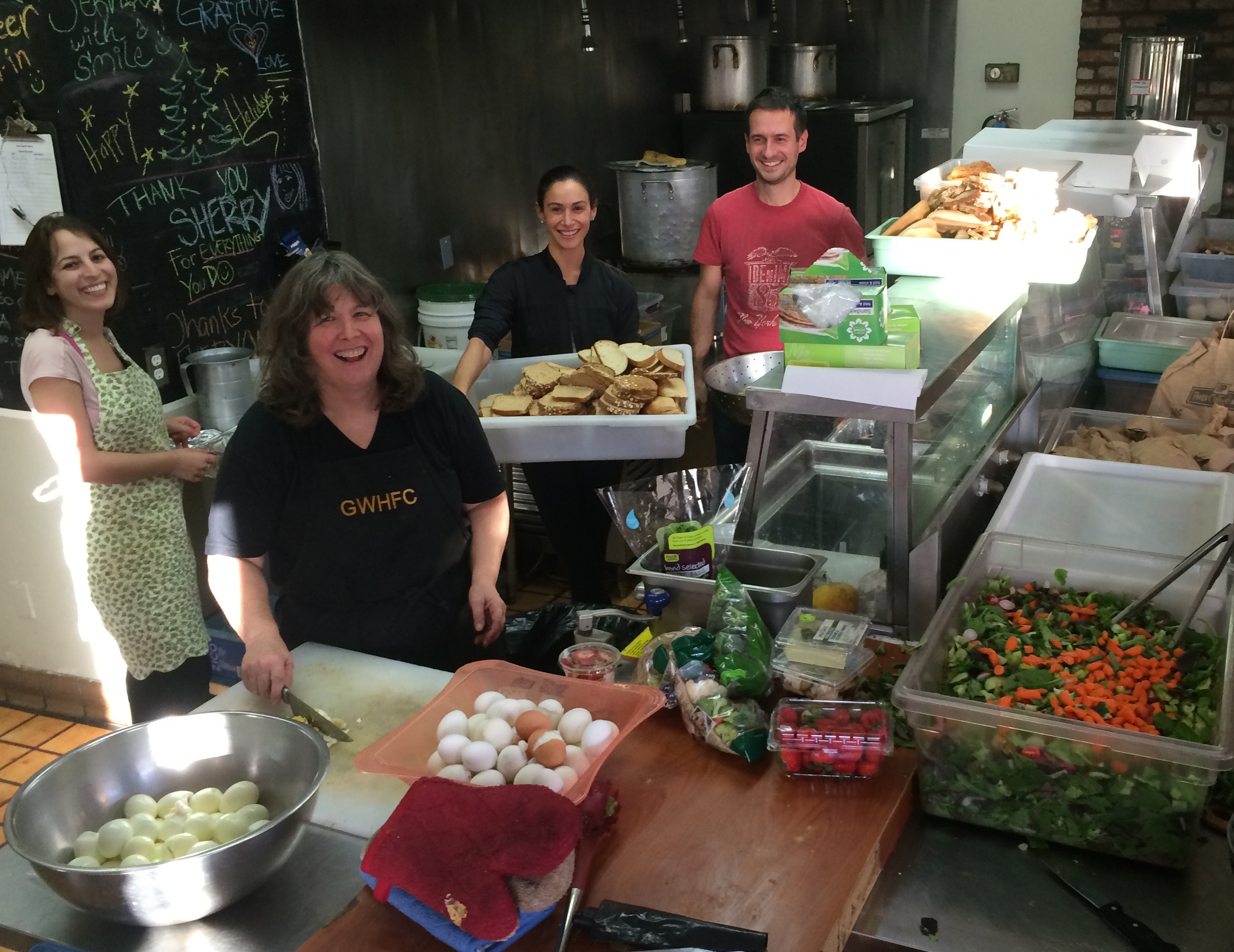 Volunteers making magic in GWHFC's rented kitchen