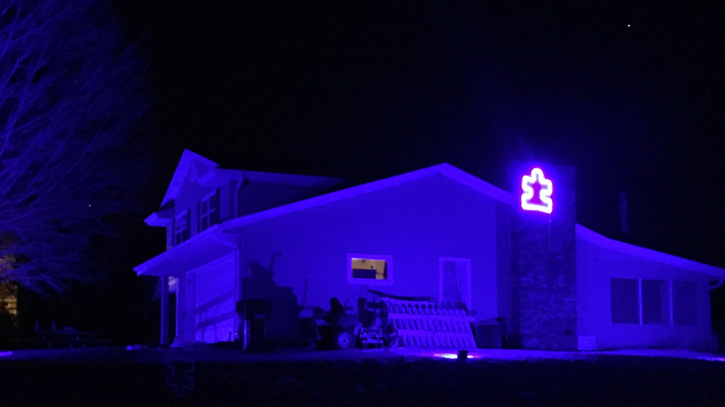 Quin's house for LIUB day with our custom made Autism Speaks sign