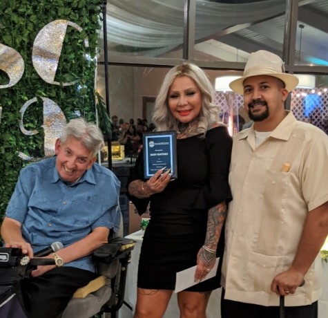 Ken & Dennis giving Daisy her 20 years with TASC award