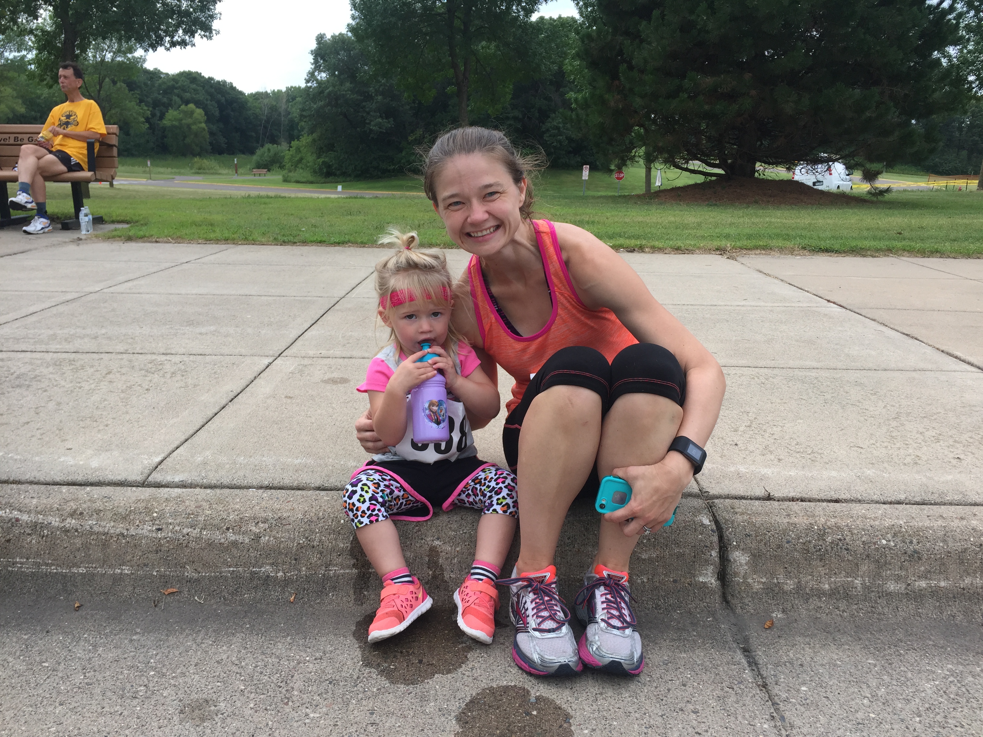 Kenley cooling off after her 2nd race (age 2) with Auntie Jenny, a marathon runner