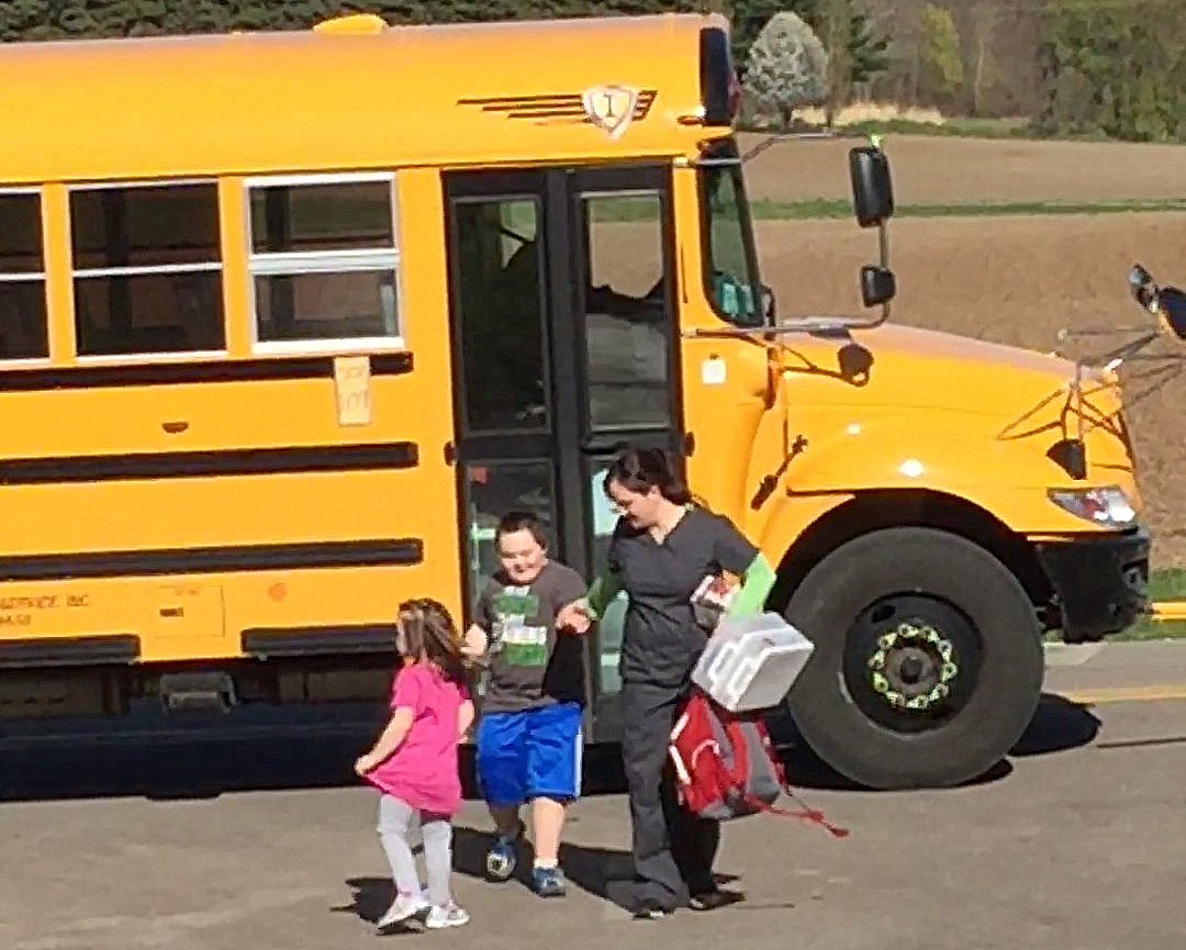 Quin's bus ride home on a BIG bus for his B-day!
