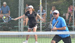 playing with Mike last year and doing my best to set up his great volleys :)