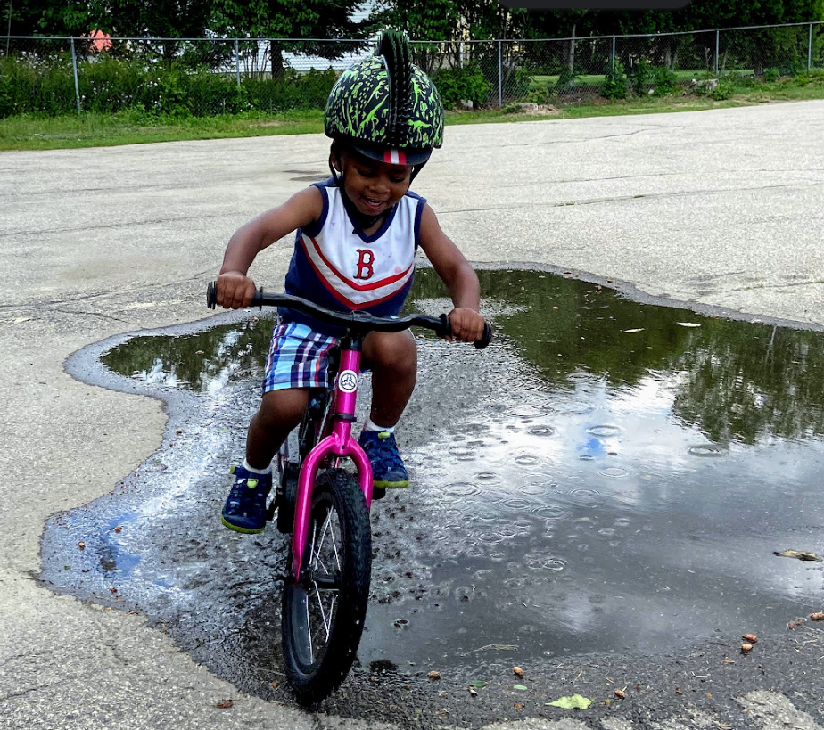 Sol loves to ride, on his bike and up with Rachel or Andrew