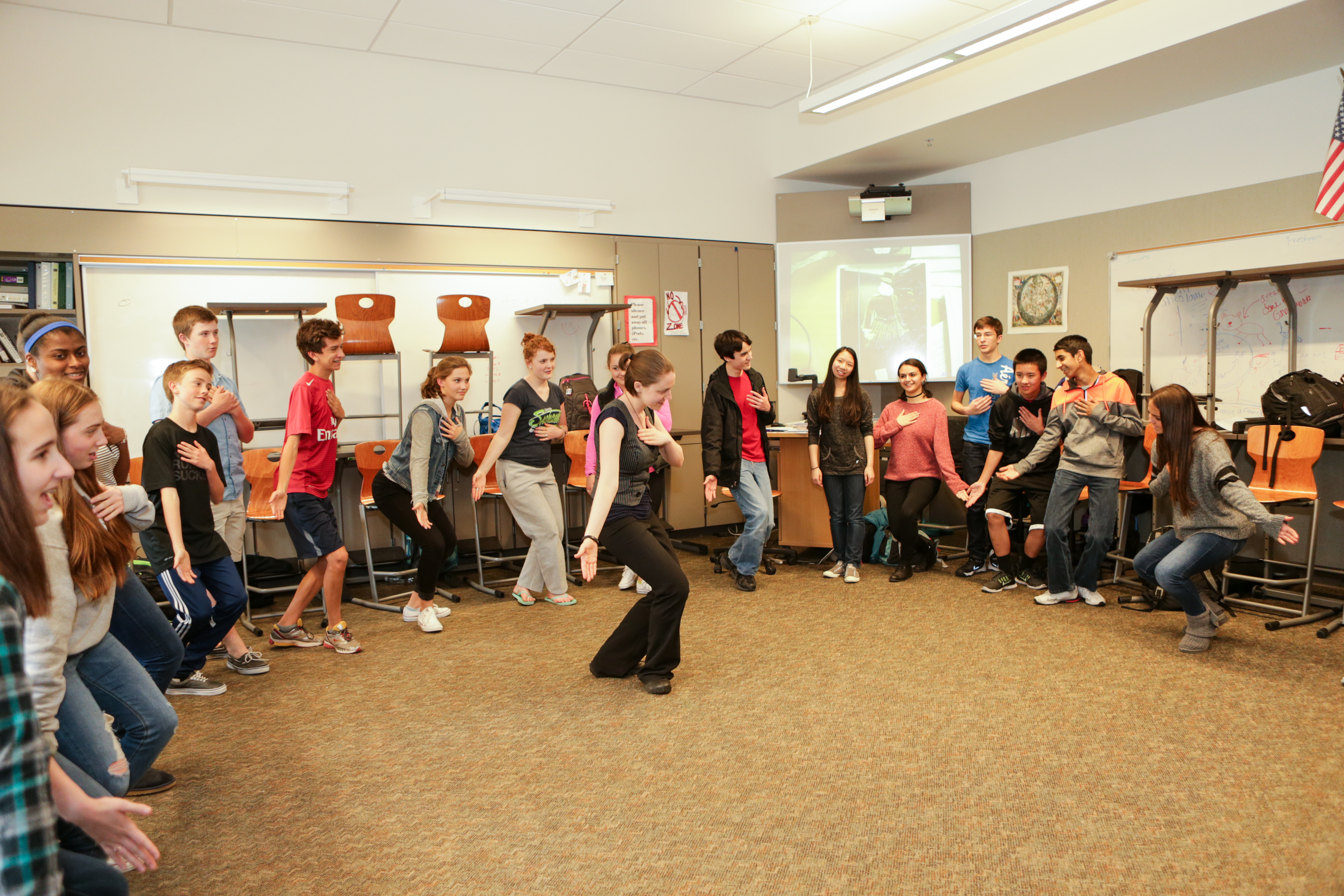 Education Director, Michelle Burce, leads students at an in-school residency, photo by John Ulman