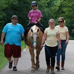 True Friends also offers therapeutic horseback riding with our True Strides program