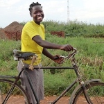 Ugandan woman with BnB bike